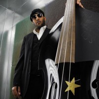 Miles Mosley with bass