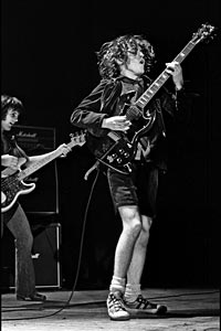 Mark Evans with Angus Young