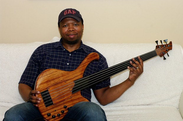 Vuyani Wakaba with his HJC Customs Alchemy Fretless 5 Bass
