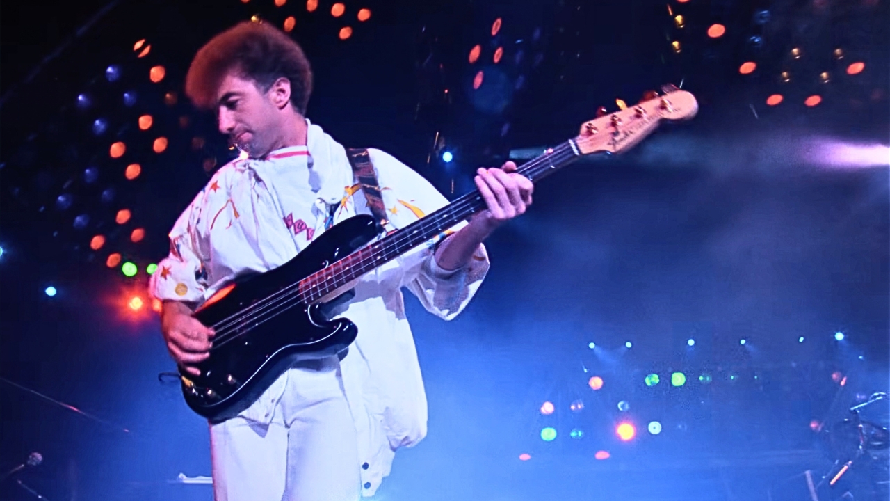 John Deacon and Queen Tear Through “Tie Your Mother Down” in Budapest
